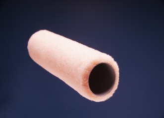 A pink paint roller
