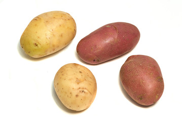Four potatoes isolated on white background