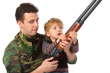 Father and son with gun