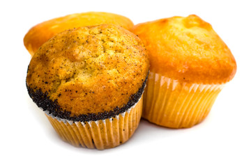 Three muffins isolated on white