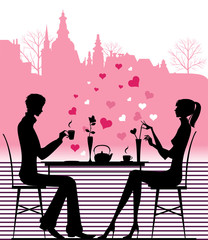 Silhouette of the couple in the cafe.