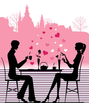 Silhouette of the couple in the cafe.