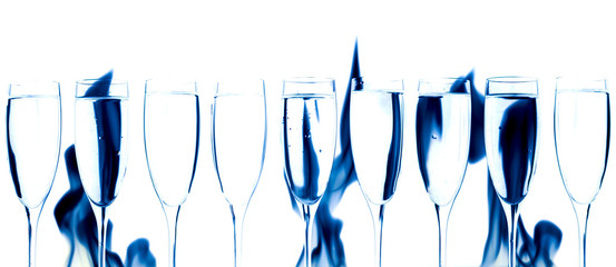 Set of crystal glasses and blue smoke