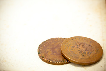a pair of old soviet and russian coins over plane paper. copy sp