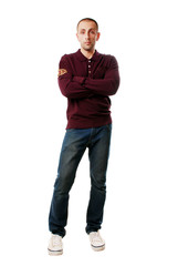 Fototapeta premium a happy young man in jeans and a shirt on a white background