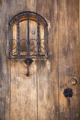 Antigua City, Guatemala, Central America; Wooden door..