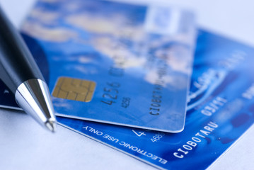Credit Card with black pencil and narrow focus