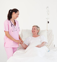 Obraz premium Nurse with an elderly patient