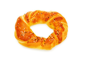Doughnut with poppy-seeds isolated on the white