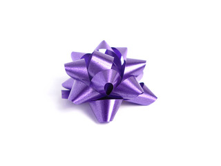 Purple gift bow in white background