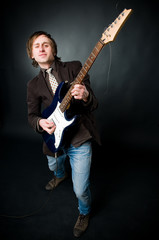 Fototapeta premium Man playing electro guitar