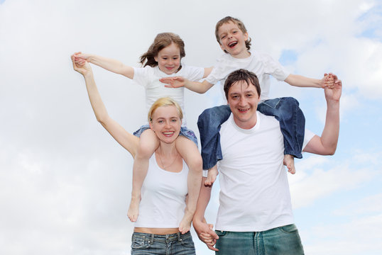 Cheerful family with two children