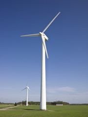 Wind power station towards blue sky
