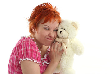 red haired woman with teddy bear isolated on white background