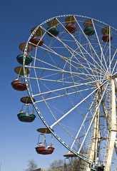 Fototapeta premium Big wheel on a background of the blue sky