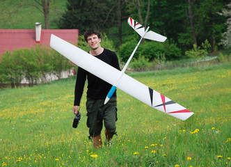 man with aircraft model