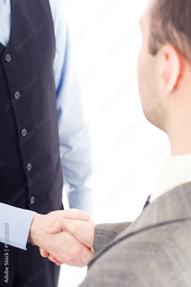 Poster Two business men handshaking, isolated on white