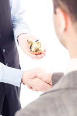 Obraz premium Business men with piggybank isolated on white