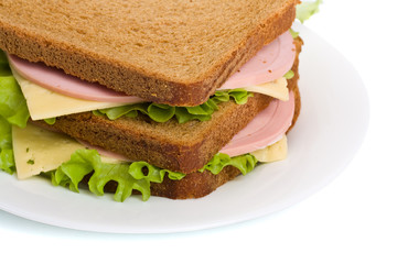 whole wheat  sandwiches with meat,cheese and lettuce