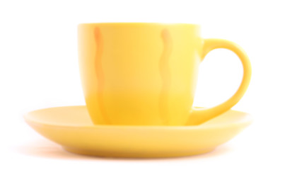 yellow cup isolated on white