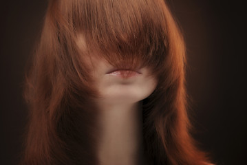 Hair covering female face