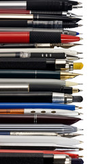 various fountain pens, ball pens and pencils