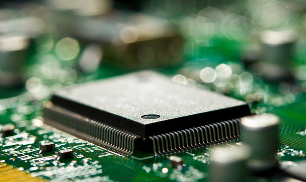 chip on green circuit board with selective focus