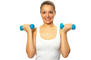 Pretty youn woman with dumbbells