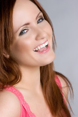 Obraz premium Laughing Young Woman