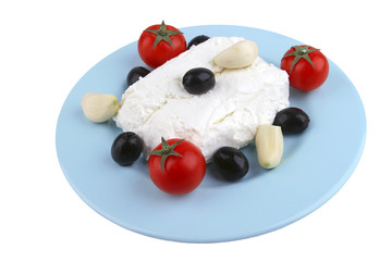 white cottage cheese with olives and cherry