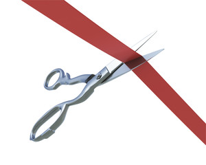 Scissors cutting a ribbon