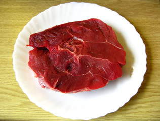 piece de boeuf dans son assiette