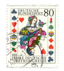 Old canceled german stamp with Playing card