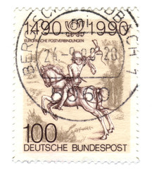 Old canceled DDR german stamp with hourse and soldier