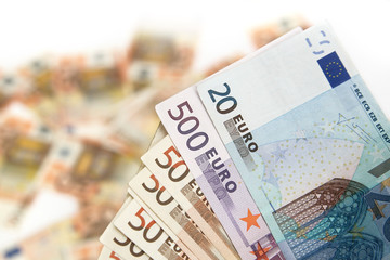 euro banknote on a blured background of money