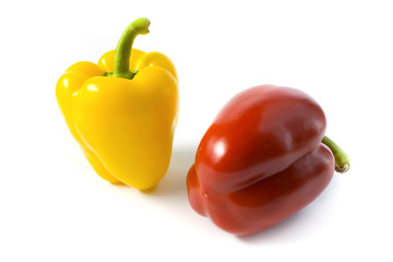Red and yellow pepper on a white background