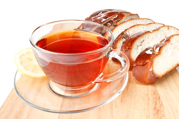 Fresh bun and cup of tea