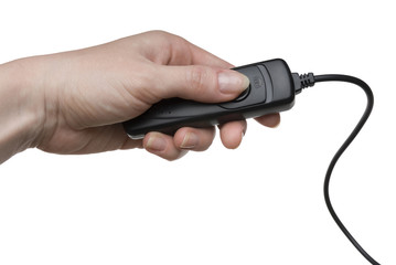Woman hand with a shutter release cable