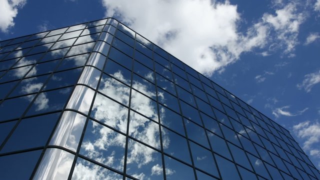 Timelapse - Clouds Reflected in Mirrored Windows