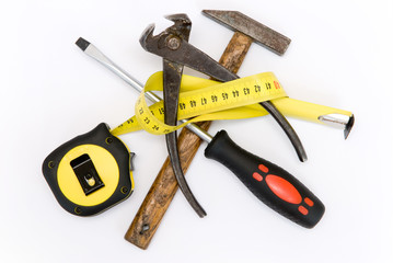 Measuring tape, hammer and cutter