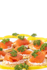 Smoked salmon and cream cheese on crackers