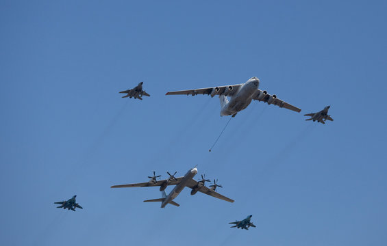 VKS Russian Airforce tanker aircraft (Il-78) and strategic bomber Tupolev Tu-95 (Bear) with  interceptors MiG-29 Fulcrum