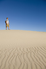 Hiker on a Sand Dune