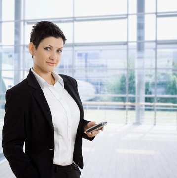 Businesswoman using mobile