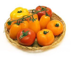 The red, yellow and orange tomatoes on a platter