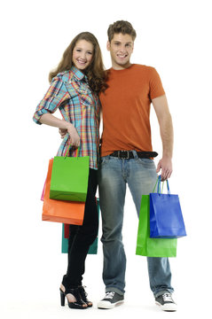 Shopping couple smiling. on white background