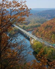 Fall leaves frame highway bridge