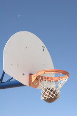 Basketball entering hoop