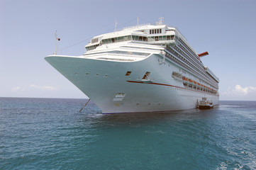 Fototapeta na wymiar Cruise Ship at Anchor Off Halfmoon Key in the Bahamas