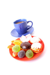 Coffee with milk color cup with cakes on white background